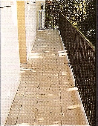 Walkways cracked from spalling as a result.